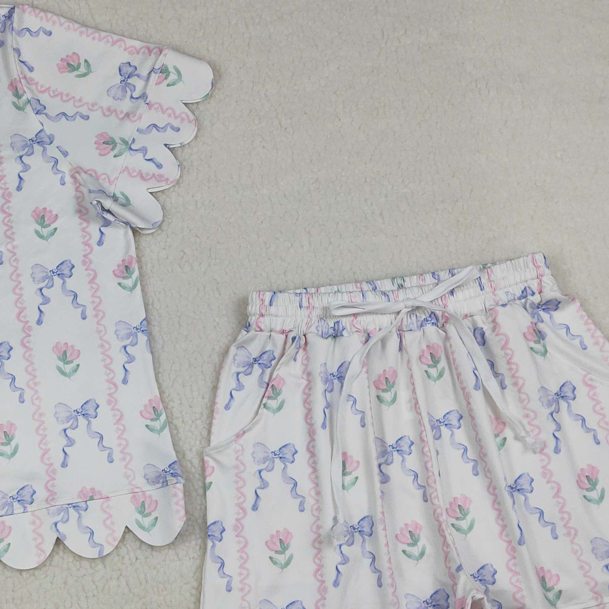 4.9 GSSO3405 RTS NO MOQ (In stock)Short sleeves floral bow top shorts adult women outfits
