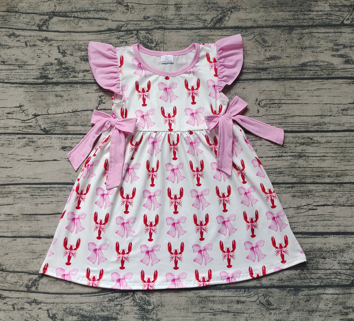 GSD1890Pink Flutter Sleeve Bow Crawfish Baby Girls Dress Cute Feminine Infant Clothing with Bow Detail And Flared Sleeves