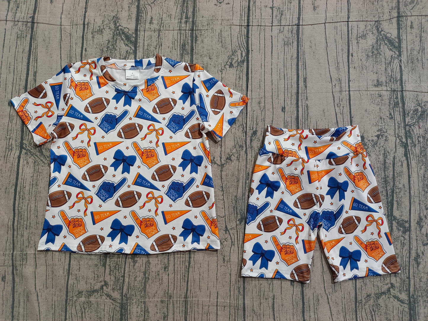 1.9 GSSO2722 Sample No Moq Baby Girls Navy Orange Bows Footballs Top Shorts Team Pajamas Sets