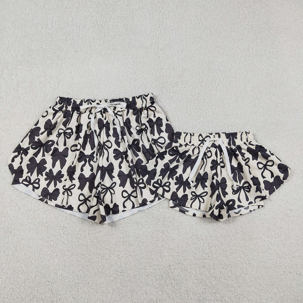 12.30 RTS NO MOQ （In stock）SS0770 Baby Girls Summer Shorts Baby Girls Black Bows Yoga Active Ruffle Shorts Bottom