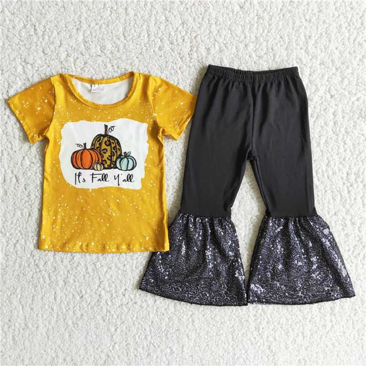 A2-12 Pumpkin yellow short-sleeved top and black sequined pants