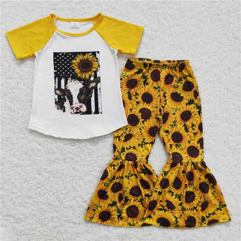 B12-24  Yellow heifer bell set