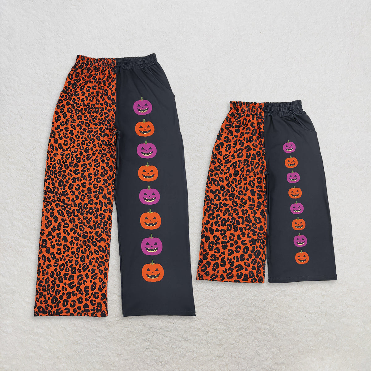 RTS NO MOQ milk silk Sibling Adult To Match Kids Halloween Split Leopard And Black Wide Leg Pants Colorful Pumpkin Print Trousers