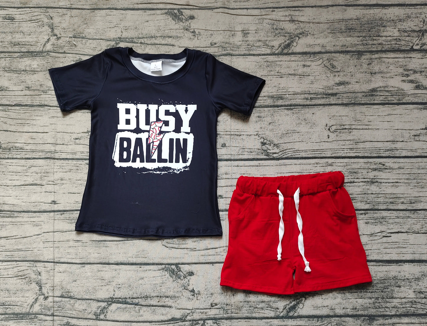 BSSO1318Black Busy Ballin' Baseball Top with Red Shorts Set for Boys Fashionable Sports Outfit Combination