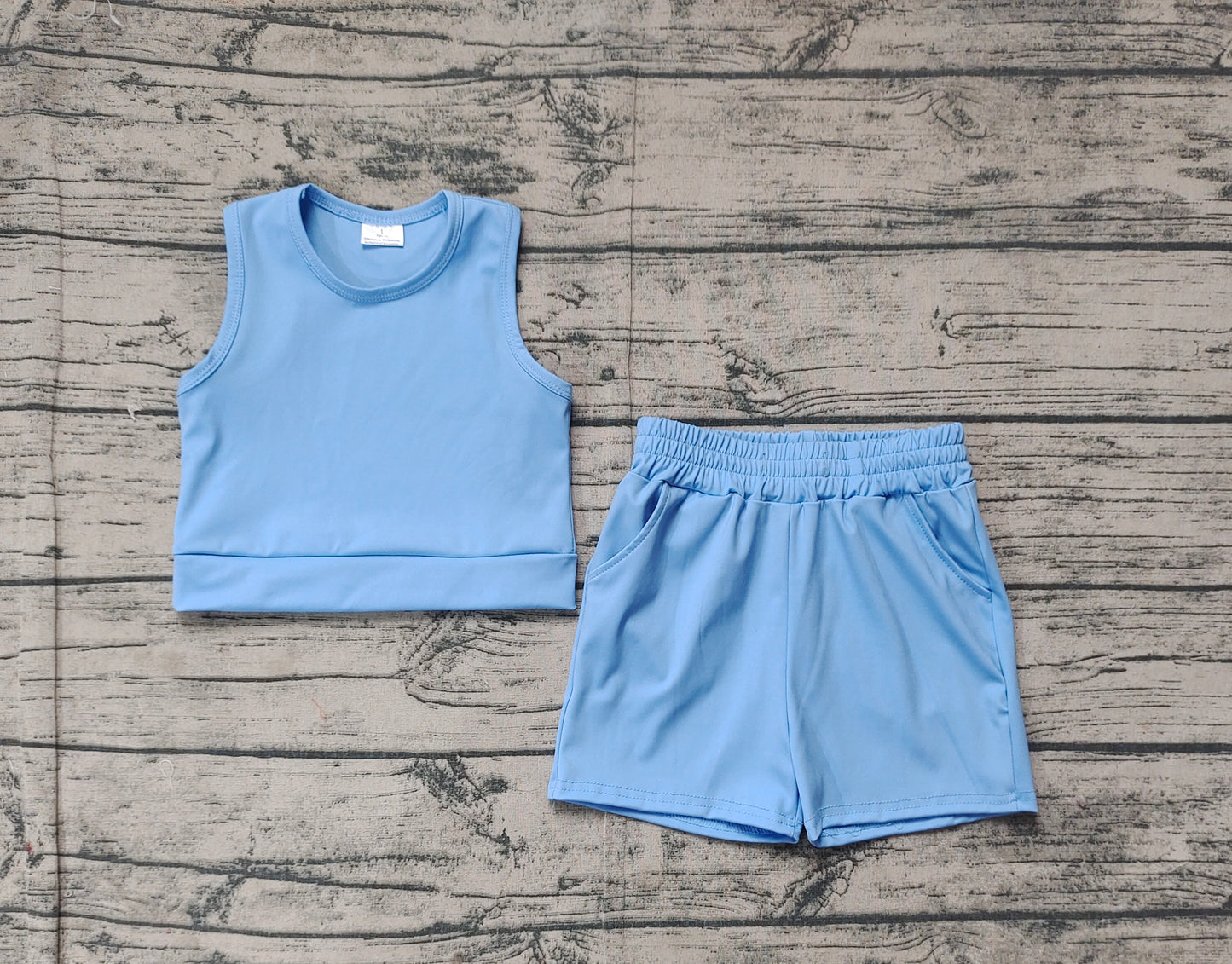 GSSO2132Girls Active Wear Light Blue Sleeveless Top with Pockets And Shorts Set - Comfortable Sportswear for Kids
