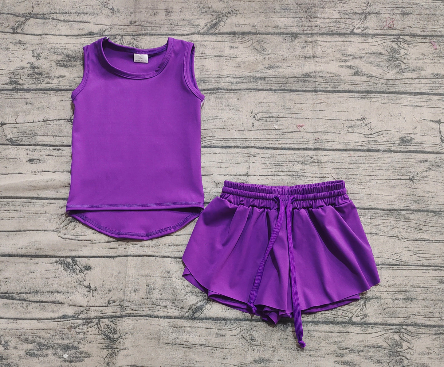 8.01  GSSO2573Sample No Moq Fast Coming Baby Girls Yoga Outfits Baby Girls Purple Sleeveless Top Skort Yoga Set