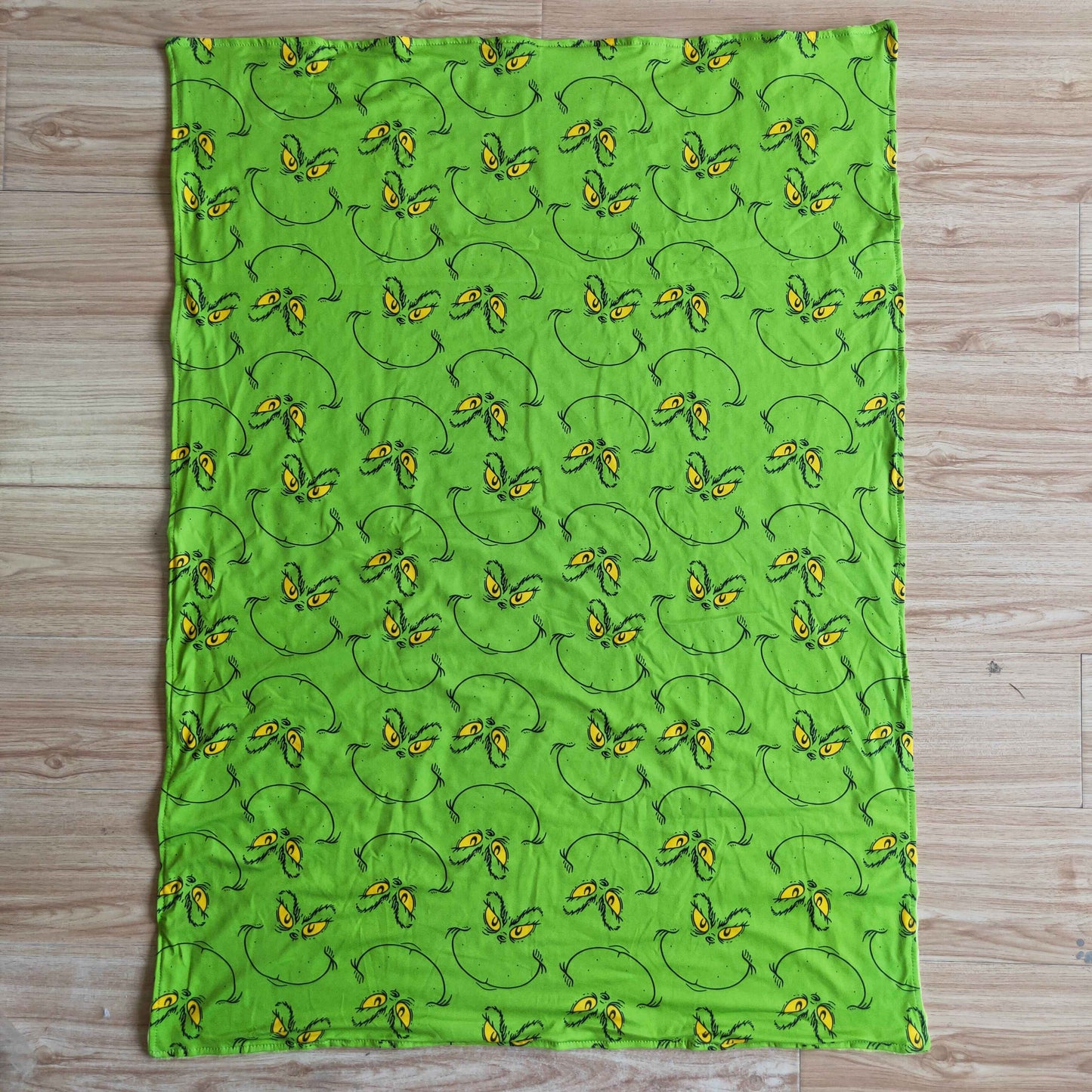 cartoon green face swaddle blanket
